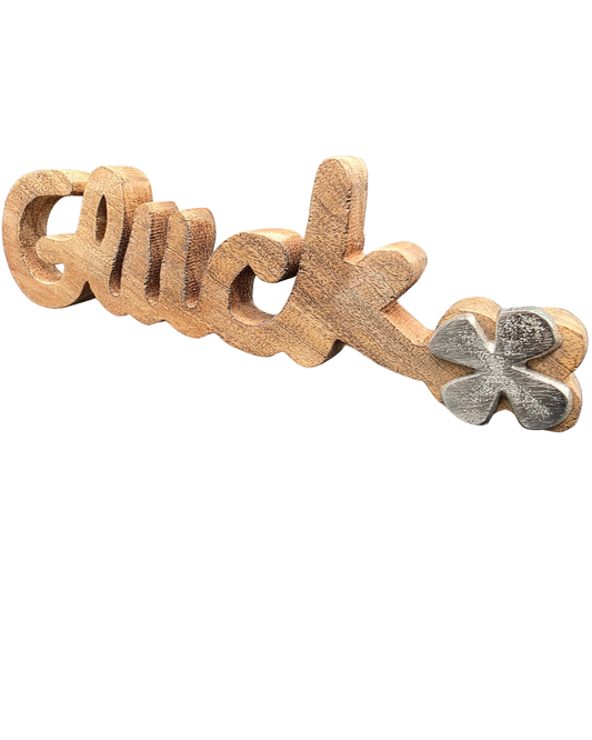Schriftzug „Glück“ mit Kleeblatt